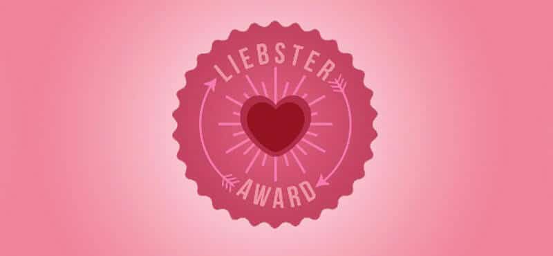 Logo de los premios Liebster Awards. Corazón sobre círculo rosa con la inscripción: Liebster Award