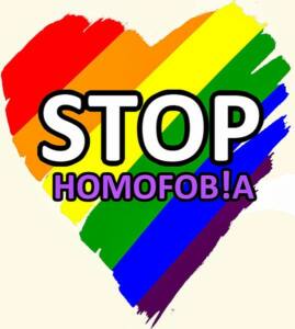 Logo de un corazón con los colores del arco iris y el lema: Stop homofobia.